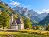Illustration of Theth Church and Theth Valley beneath the Albanian Alps