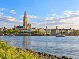 Illustration of Antwerp's historic waterfront and Cathedral of Our Lady from across the Scheldt