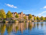 Illustration of Historic canal-side warehouses in Groningen