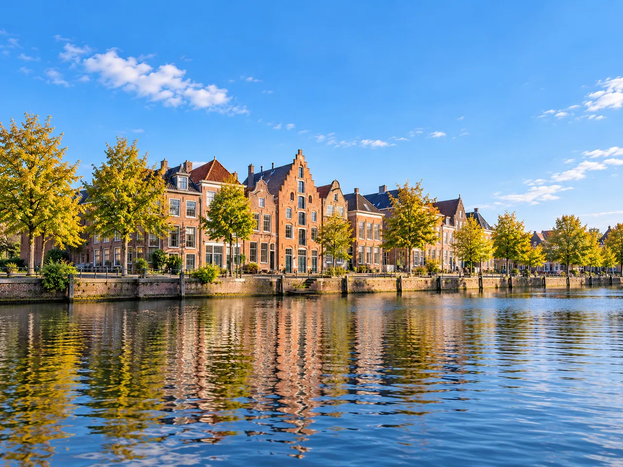 Illustration of Historic canal-side warehouses in Groningen