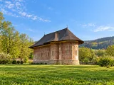 Illustration of Representative Bucovina painted monastery church exterior, informed by Humor's towerless form