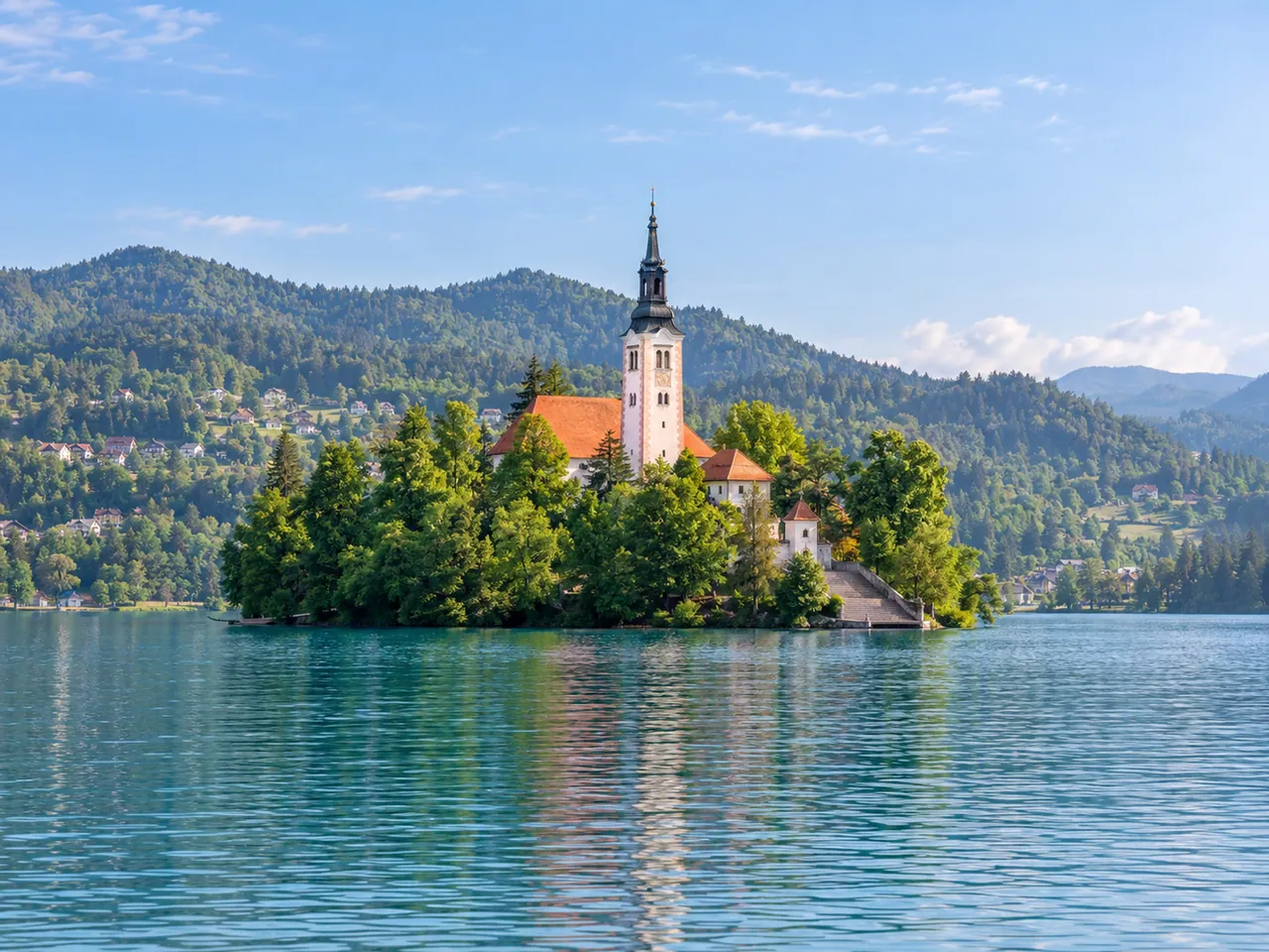 Illustration of Bled Island and Church of the Mother of God viewed across the lake from a western/southwestern lakeshore viewpoint