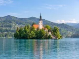 Illustration of Bled Island and Church of the Mother of God viewed across the lake from a western/southwestern lakeshore viewpoint