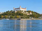 Illustration of Bratislava Castle above the Danube from the opposite riverbank
